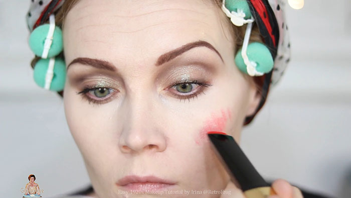 Blush rosy cheeks for 1920s flapper makeup look